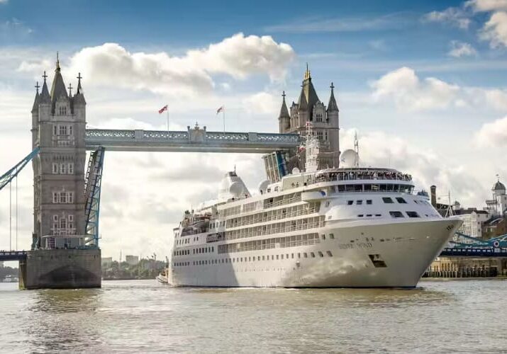 Cruise ship passing under Tower Bridge.